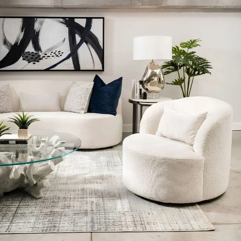 Bernhardt Elle 布旋轉椅奶油白布料紋理與圓弧椅身細節。